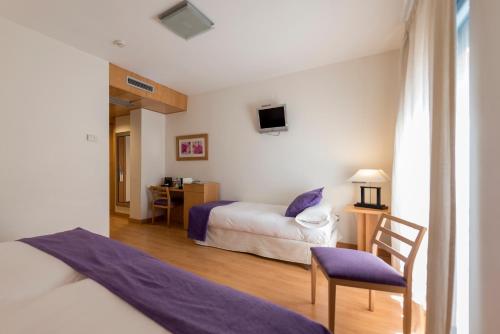 Habitación Triple del hotel Itaca Salamanca by Soho Boutique. Foto 5