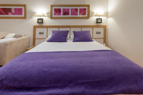 Habitación Triple del hotel Itaca Salamanca by Soho Boutique. Foto 8