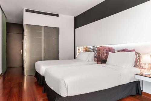 Habitaciones Comunicadas Familiares del hotel Hilton Madrid Airport. Foto 1