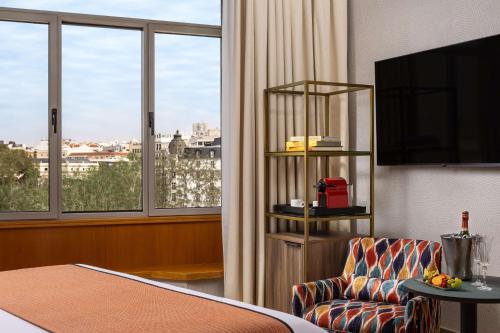 Habitación Prémium con vistas al Prado del hotel Nh Collection Madrid Paseo Del Prado. Foto 1