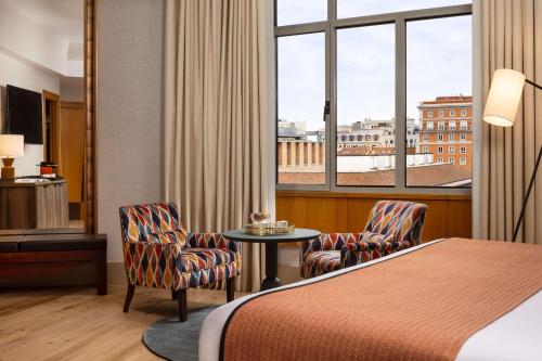 Habitación Premium XL con vistas al Prado del hotel Nh Collection Madrid Paseo Del Prado. Foto 2