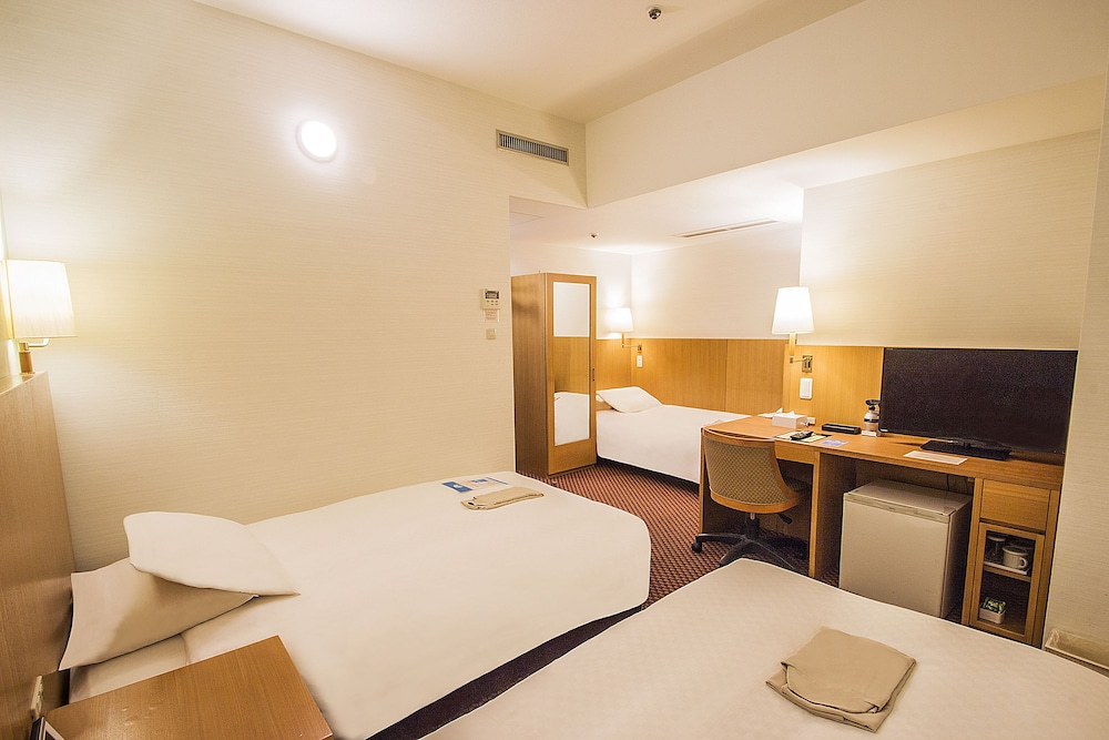 Habitación triple, no fumadores del hotel Hearton Shinsaibashi. Foto 4