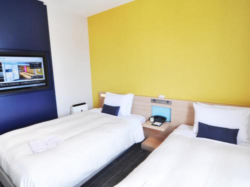 Habitación Triple - No fumadores del hotel Sotetsu Grand Fresa Osaka - Namba. Foto 4