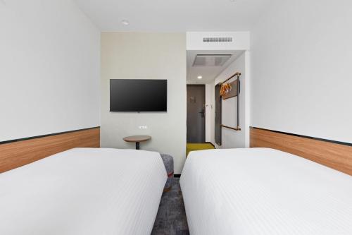 Habitación Doble Económica - 2 camas - No fumadores del hotel Sotetsu Grand Fresa Osaka - Namba. Foto 10