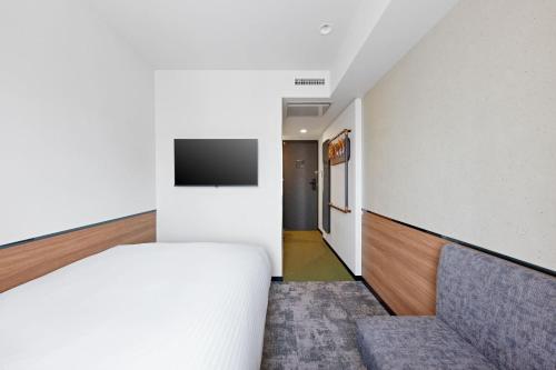 Habitación Doble Económica - No fumadores del hotel Sotetsu Grand Fresa Osaka - Namba. Foto 5