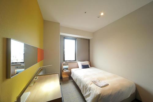 Habitación Individual - No fumadores del hotel Sotetsu Grand Fresa Osaka - Namba. Foto 4