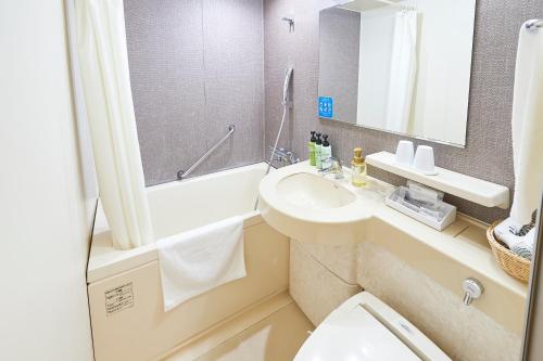 Habitación Doble Económica - 2 camas - No fumadores del hotel Sotetsu Grand Fresa Osaka - Namba. Foto 4