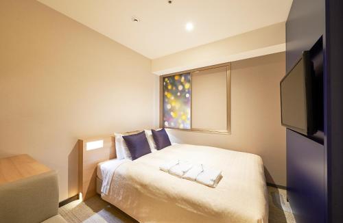 Habitación Doble - No fumadores del hotel Sotetsu Grand Fresa Osaka - Namba. Foto 8