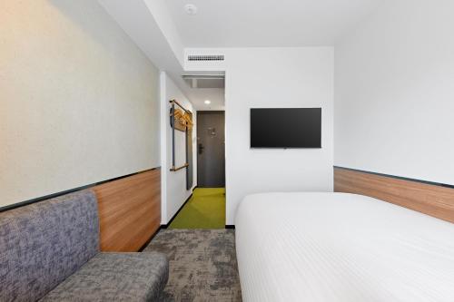 Habitación Doble Económica renovada - No fumadores del hotel Sotetsu Grand Fresa Osaka - Namba. Foto 1