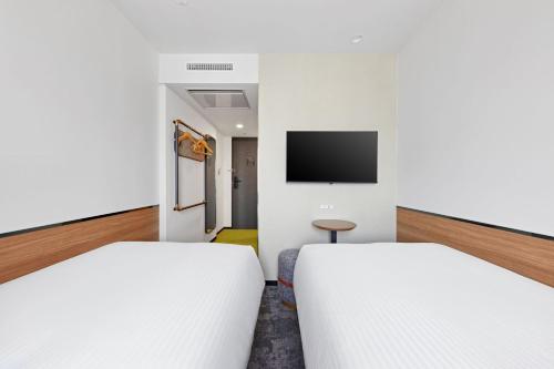 Habitación Doble Reformada - No fumadores - 2 camas del hotel Sotetsu Grand Fresa Osaka - Namba. Foto 1