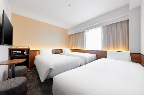 Habitación Triple Renovada - No fumadores del hotel Sotetsu Grand Fresa Osaka - Namba