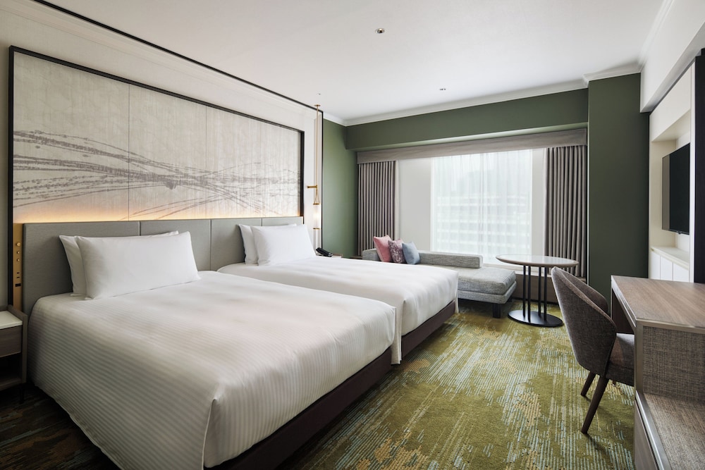 Habitación estándar, 2 camas dobles del hotel Rihga Royal Osaka. Foto 1