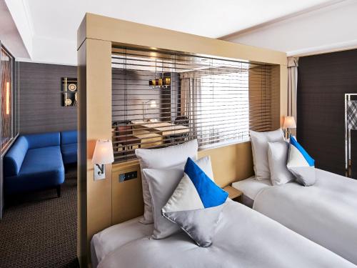 Cuenta con 2 camas individuales premium en planta superior del hotel Ana Crowne Plaza Kanazawa, An Ihg. Foto 1