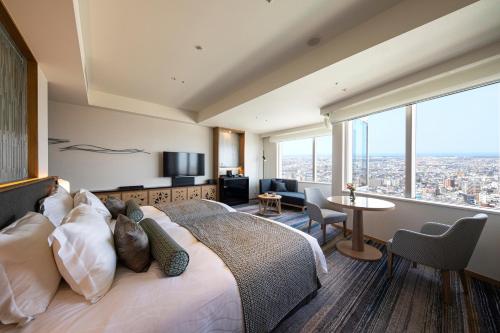 Habitación Deluxe Hollywood doble con 2 camas en la planta Nikko - No fumadores del hotel Nikko Kanazawa. Foto 1