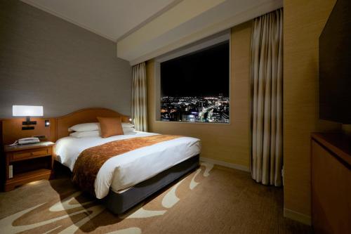 Habitación doble Vista ciudad Confort 1 Cama doble del hotel Nikko Kanazawa. Foto 1