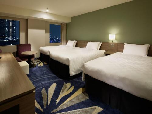 Habitación Doble con cama supletoria - 2 camas - Planta 10 a 24 - No fumadores del hotel Sunshine City Prince