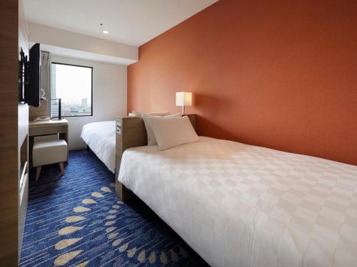 Habitación Doble Económica - 2 camas - Planta 10 a 16 - No fumadores del hotel Sunshine City Prince