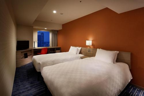 Habitación Doble - 2 camas - Planta 10 a 24 - No fumadores del hotel Sunshine City Prince