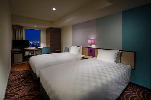 Habitación Doble - 2 camas - Plantas 26 a 32 - No fumadores del hotel Sunshine City Prince