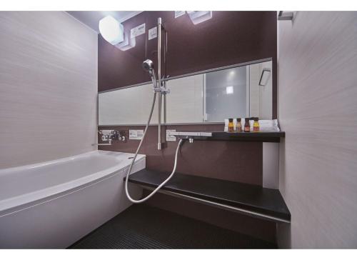 Habitación Cuádruple - No fumadores - Plantas 33 a 37 del hotel Sunshine City Prince
