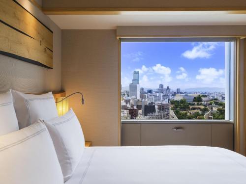 Suite Waon con cama extragrande del hotel Swissotel Nankai Osaka. Foto 5