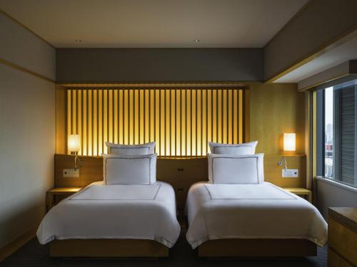 Suite Waraku con 2 camas individuales del hotel Swissotel Nankai Osaka. Foto 5