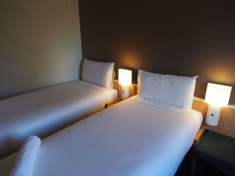 Habitación estándar, 2 camas individuales del hotel Ibis Sydney Thornleigh. Foto 1