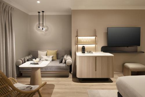 Habitación con cama extragrande del hotel Hilton Palm Cove Cairns Resort & Spa