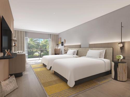 Habitación con 2 camas grandes - Adaptada para personas con discapacidad del hotel Hilton Palm Cove Cairns Resort & Spa