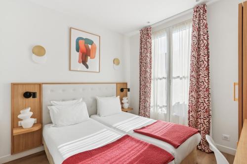 Habitación Twin (2 camas individuales) del hotel Alexandrine Opera