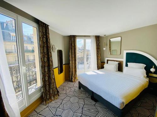 Habitación Triple con balcón del hotel Elysa - Luxembourg. Foto 3