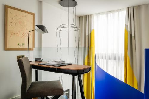Habitación Deluxe Executive del hotel Du Ministere. Foto 8