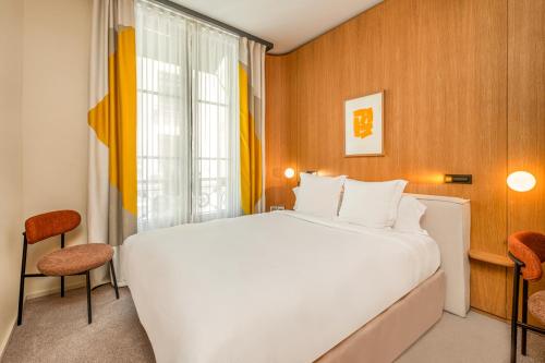 Habitación Doble - Superior del hotel Maison Honnel. Foto 1