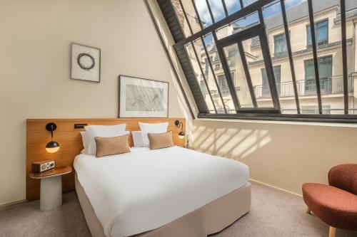 Habitación Executive Deluxe con tragaluz del hotel Maison Honnel