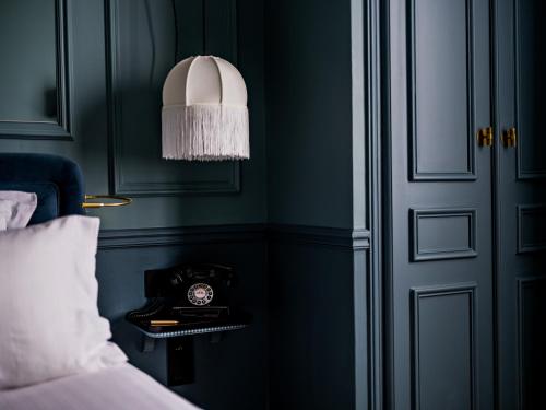 Habitación Superior reformada con balcón del hotel Duquesne Eiffel. Foto 8