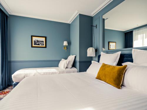 Habitación Triple Superior reformada del hotel Duquesne Eiffel. Foto 8