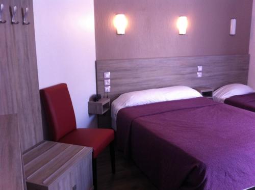 Habitación Triple del hotel Grand Magenta. Foto 1