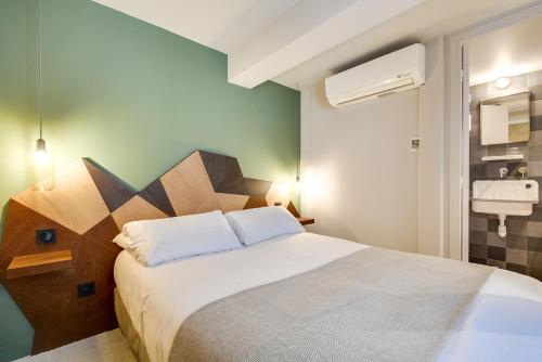 Habitación Triple del hotel Le Wit. Foto 2