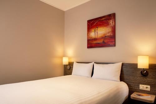 Habitación Doble Confort del hotel Timhotel Odessa Montparnasse. Foto 1