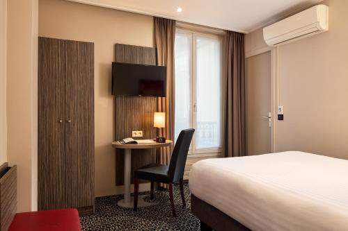 Habitación Doble Confort del hotel Timhotel Odessa Montparnasse. Foto 3