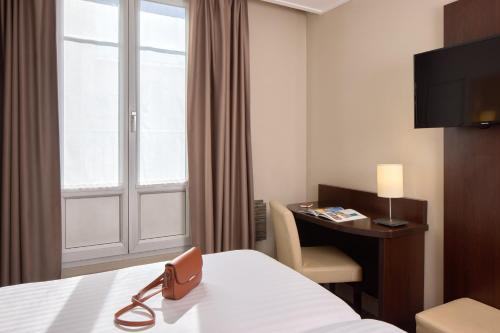 Habitación Doble Confort - 2 camas del hotel Timhotel Odessa Montparnasse. Foto 4
