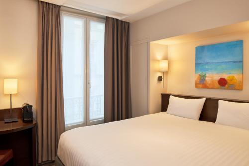 Habitación Doble Superior del hotel Timhotel Odessa Montparnasse