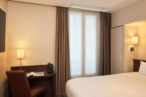 Habitación Doble Superior del hotel Timhotel Odessa Montparnasse. Foto 2