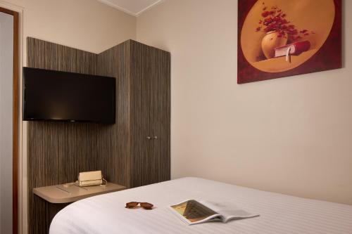Habitación Individual del hotel Timhotel Odessa Montparnasse. Foto 5