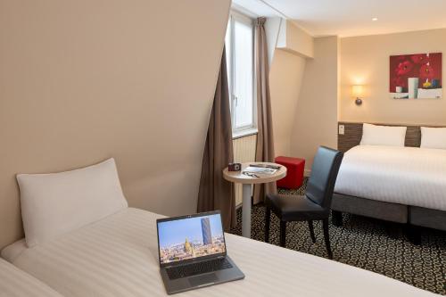 Habitación Familiar del hotel Timhotel Odessa Montparnasse. Foto 2
