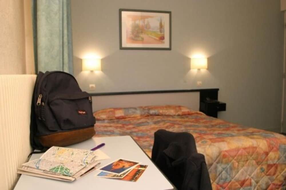 Habitación con 2 camas individuales del hotel Printania. Foto 2