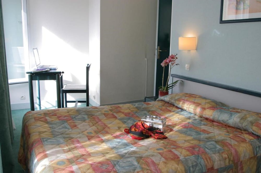 Habitación triple del hotel Printania. Foto 1