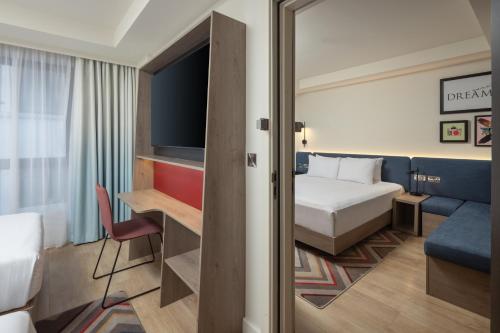 Habitación Familiar con cama queen del hotel Hampton By Hilton London City. Foto 6
