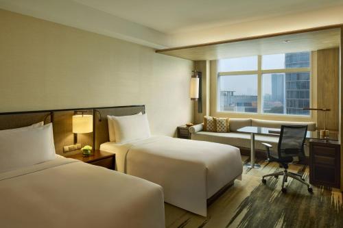 Deluxe Room Vista ciudad del hotel Gran Melia Jakarta. Foto 1