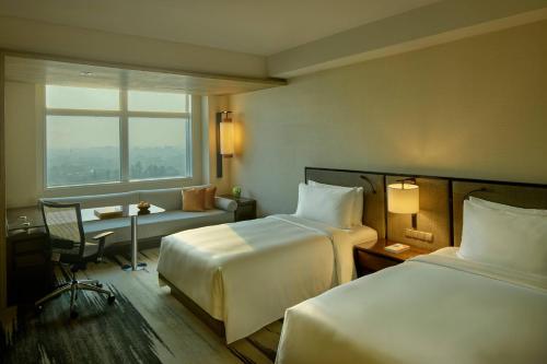 Deluxe Room Vista ciudad del hotel Gran Melia Jakarta. Foto 3